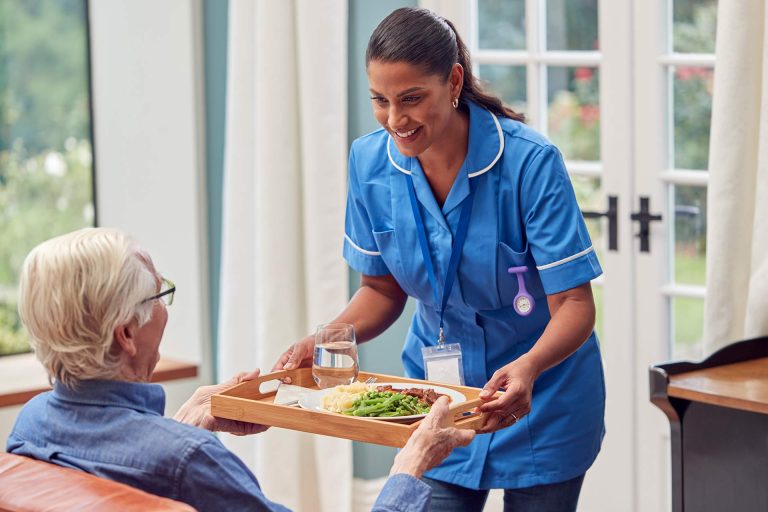 female home care specialist with patient